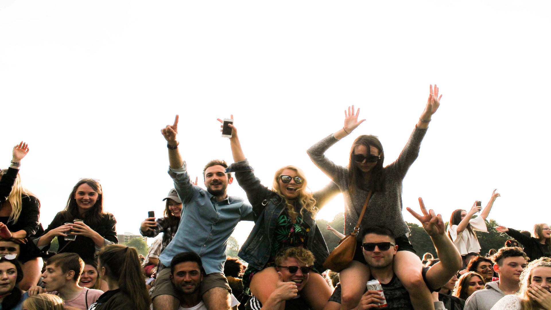 An image of a group of friends posing for a photo