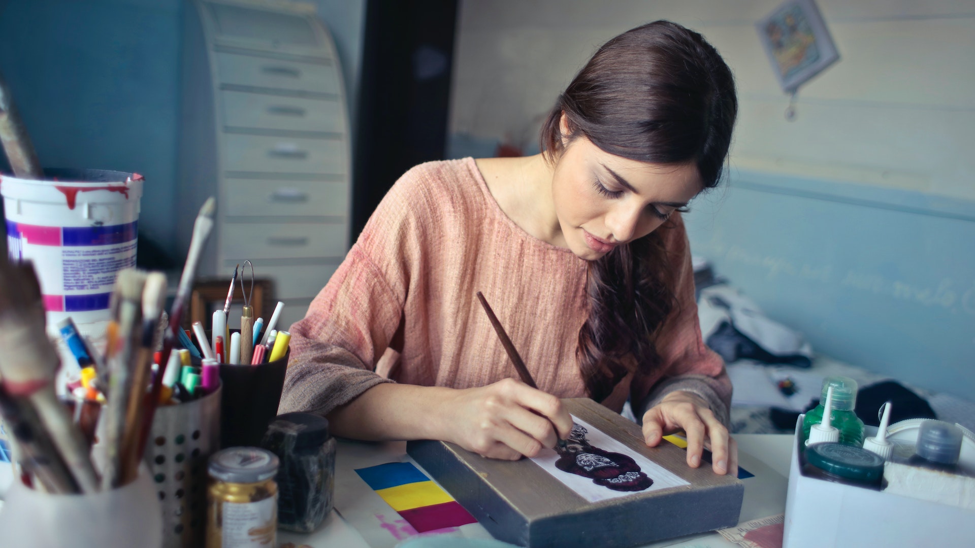 An image of a girl painting