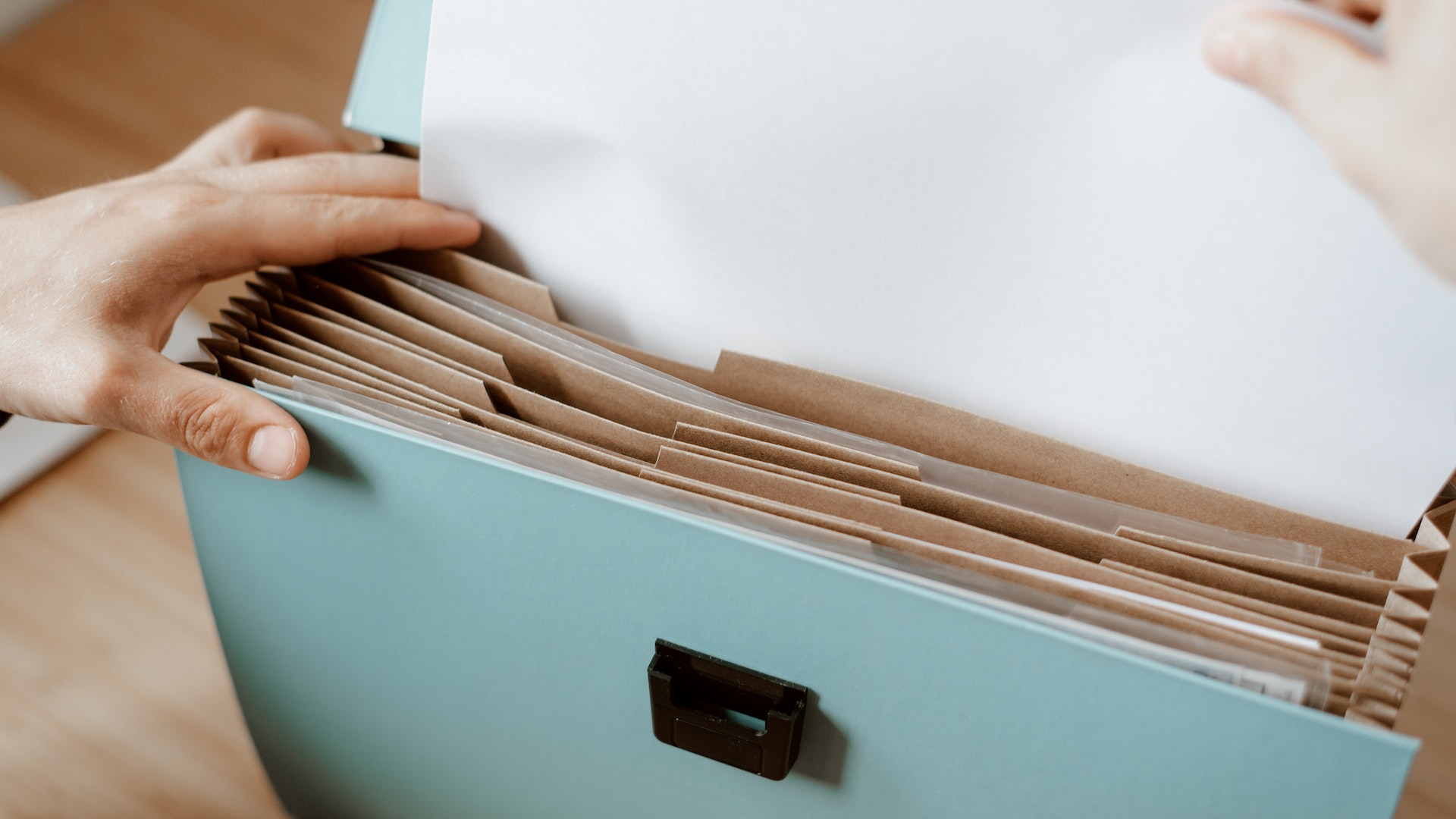 An image of a person organizing files