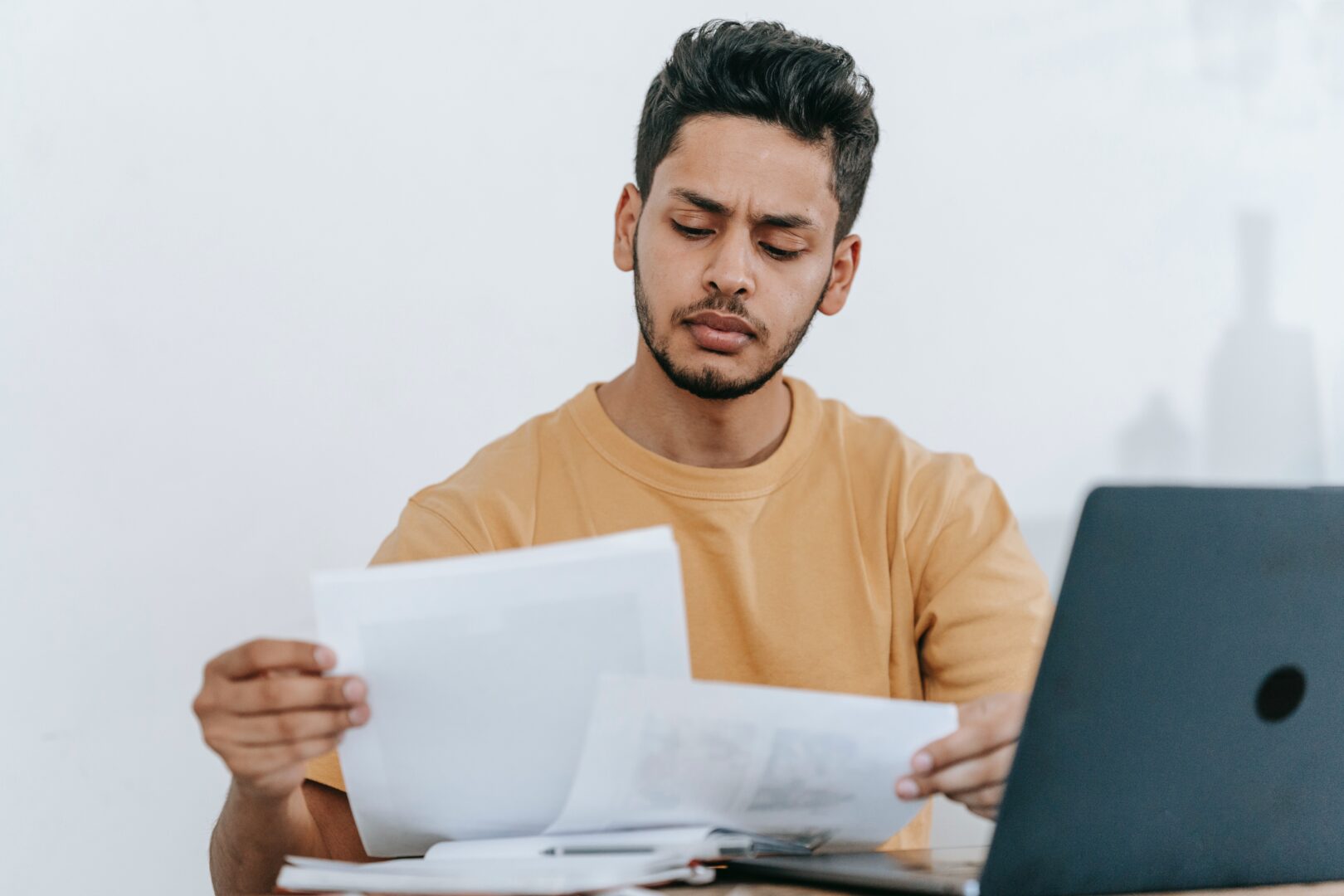 An image of a Person reviewing papers