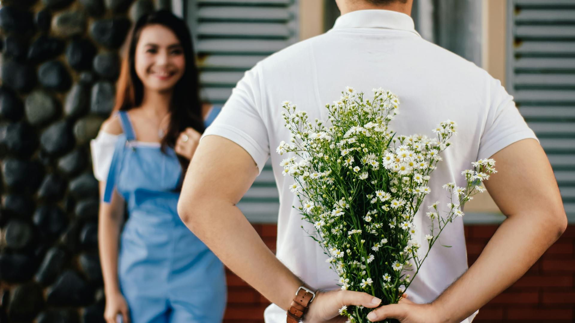 a person holding flowers